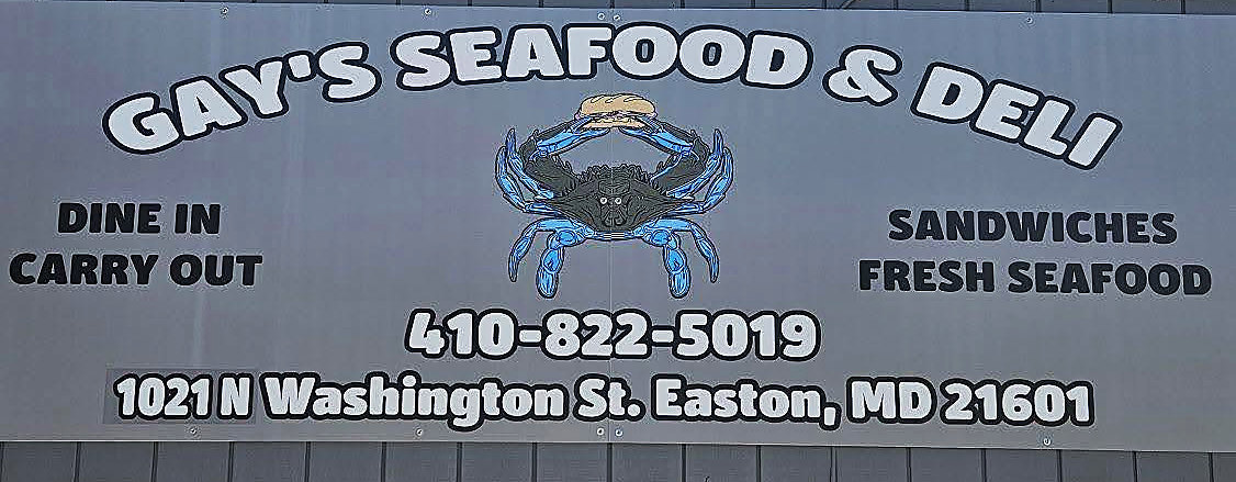 The sign on the siding: Gay’s Seafood and Deli, dine in, carry out, sandwiches, fresh seafood, 1021 N Washington St